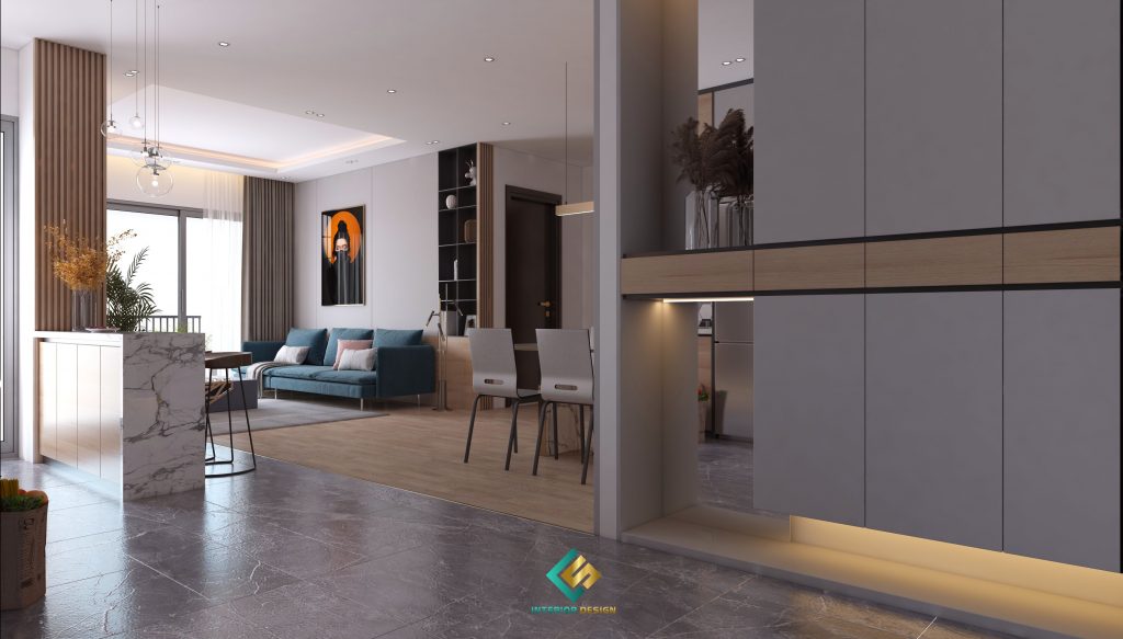 Chiếc sofa xanh dương là điểm nhấn nổi bật cho không gian phòng khách